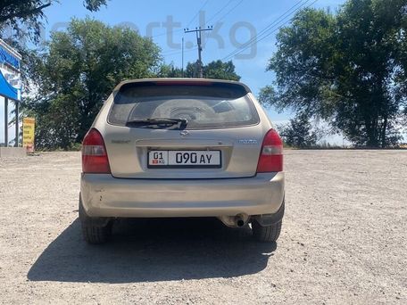 Mazda 323, 2001 — photo 2