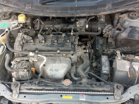 Nissan Primera, 2004 — 照片 2