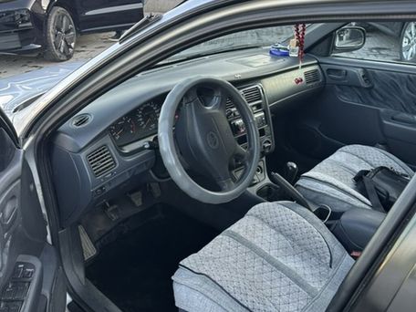 Toyota Carina E, 1997 — фото 6