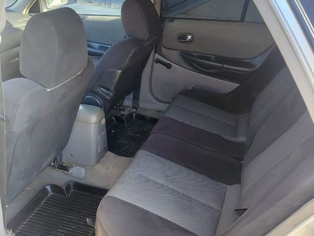 Mazda Familia, 2002 — 照片 8