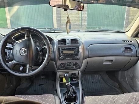 Mazda 323, 2001 — photo 8