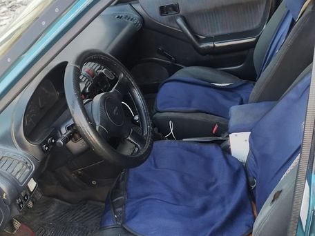 Mazda 323, 1994 — photo 5
