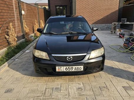 Mazda 323, 2001 — photo 4