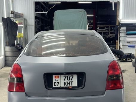 Nissan Primera, 2003 — photo 5