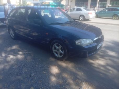 Mazda Familia, 2000 — фото 10