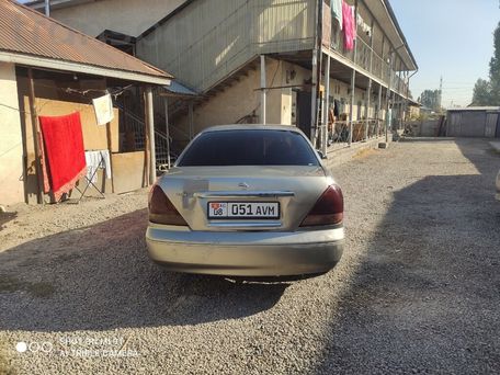 Nissan Bluebird, 2003 — photo 5