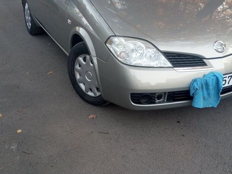 Nissan Primera, 2004 — 照片 6