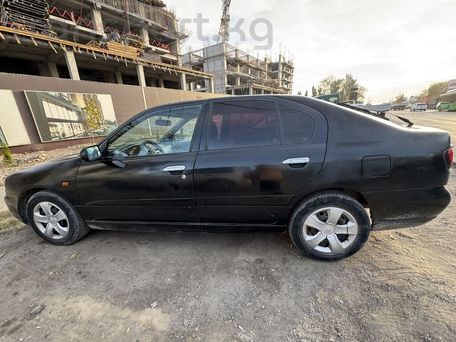 Nissan Primera, 2000 — photo 6