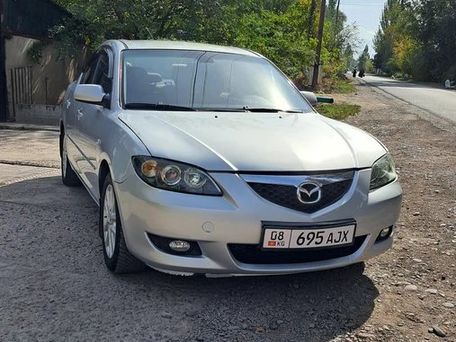 Mazda 3, 2009 — 照片 1