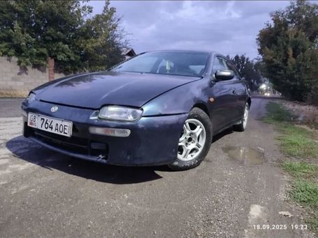 Mazda 323, 1997 — photo 1