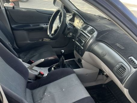 Mazda 323, 2003 — сүрөт 5