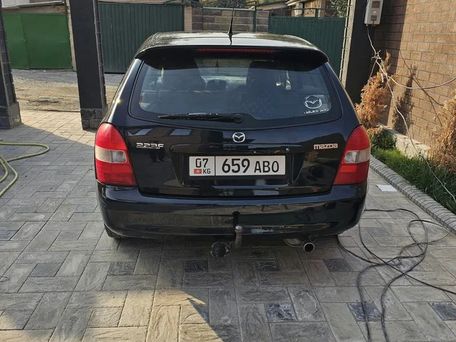 Mazda 323, 2001 — photo 3