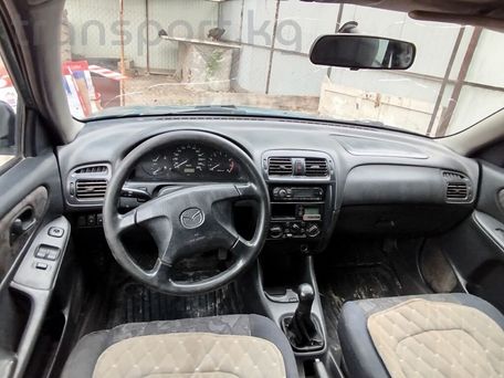 Mazda 323, 1998 — photo 1