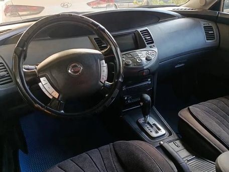 Nissan Primera, 2004 — 照片 2