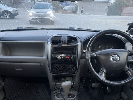 Mazda Demio, 2002 — photo 13