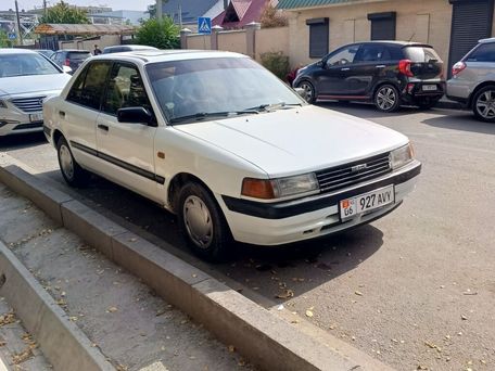 Mazda 323, 1989 — photo 1
