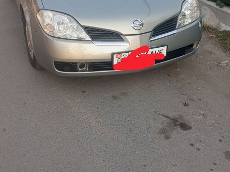 Nissan Primera, 2004 — 照片 1