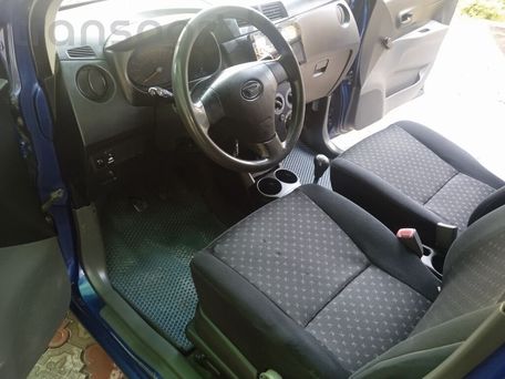 Daihatsu Cuore, 2009 — 照片 12
