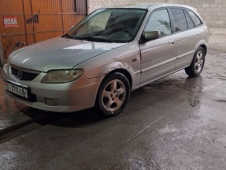 Mazda Familia, 2001 — photo 5