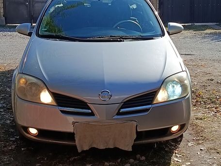 Nissan Primera, 2004 — 照片 1