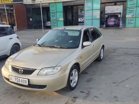 Mazda 323, 2002 — 照片 5