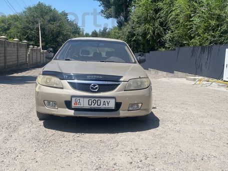 Mazda 323, 2001 — photo 1