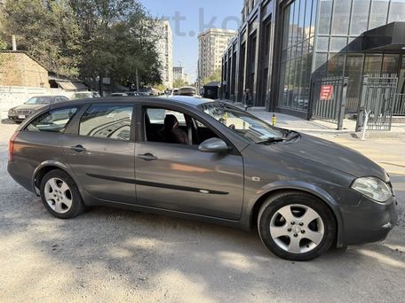 Nissan Primera, 2004 — 照片 2