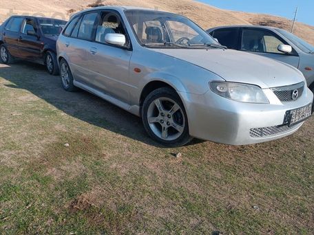 Mazda Familia, 2003 — photo 1