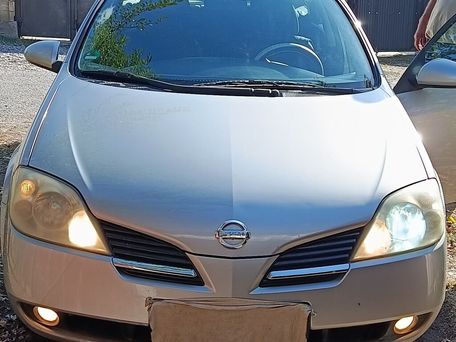 Nissan Primera, 2004 — 照片 2