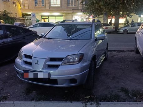 Mitsubishi Outlander Sport, 2004 — 照片 1