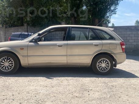 Mazda 323, 2001 — photo 4