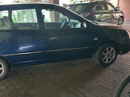 Kia Carens, 2004 — сүрөт 8