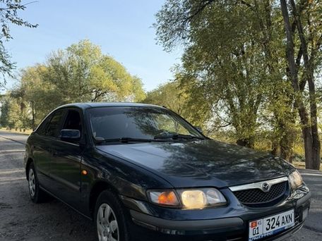Mazda 626, 1997 — 照片 1