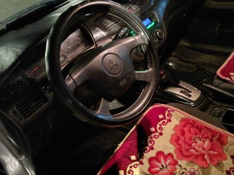 Mitsubishi Lancer, 2004 — 照片 1