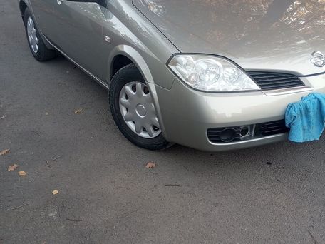 Nissan Primera, 2004 — 照片 7