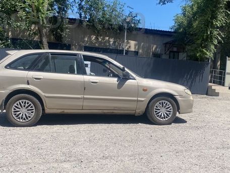 Mazda 323, 2001 — photo 3