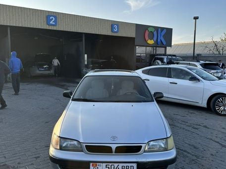 Toyota Carina E, 1997 — фото 1