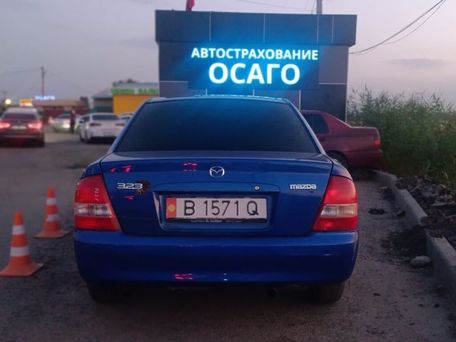 Mazda 323, 2003 — photo 3