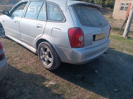 Mazda Familia, 2003 — photo 2