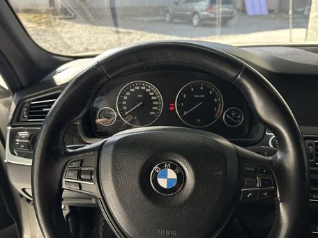 BMW 5 серии, 2010 — 照片 6