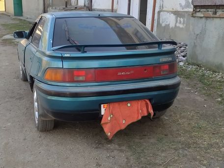 Mazda 323, 1994 — photo 3