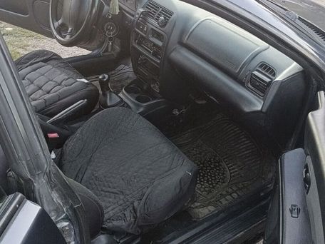 Mazda 323, 1997 — photo 16