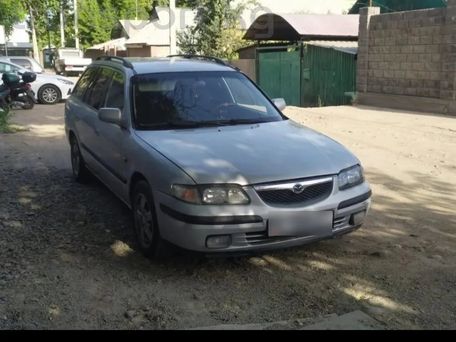 Mazda 626, 1999 — photo 1