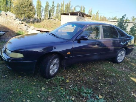 Mazda 626, 1994 — сүрөт 1