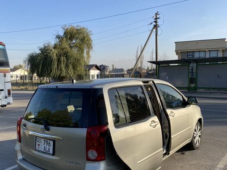 Toyota Raum, 2003 — 照片 9