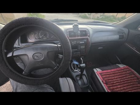Mazda Familia, 1998 — photo 2
