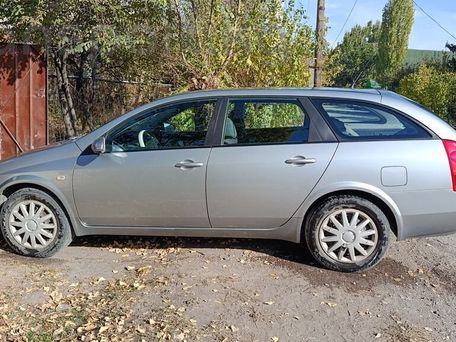 Nissan Primera, 2004 — 照片 6