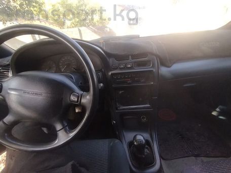 Mazda 323, 1995 — photo 9