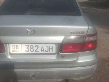 Mazda 323, 1997 — 照片 2