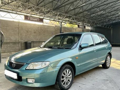 Mazda 323, 2001 — photo 6